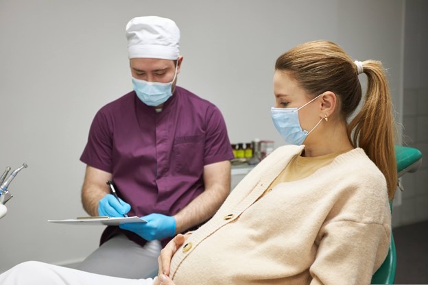 Doctor Discussing Toothache During Pregnancy with a Patient in Frenchs Forest